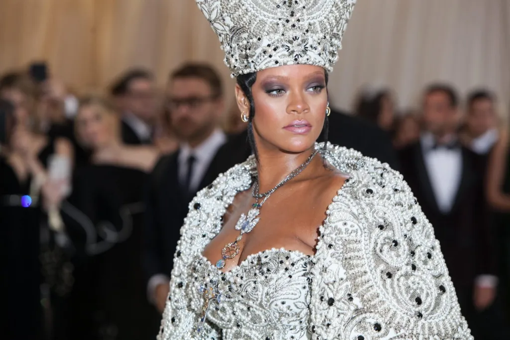 Rihanna Rocks Colorful Headdress, Bejeweled Outfit at Barbados’ Carnival